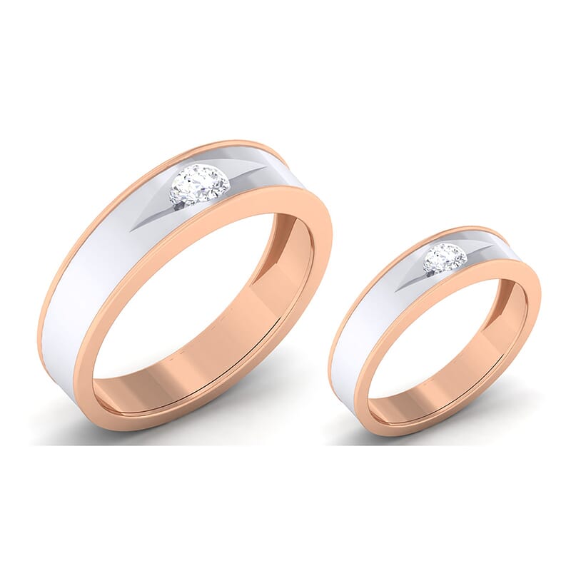 18K Gold and 0.57 Carat E Color and VS Clarity Diamond Couple Ring